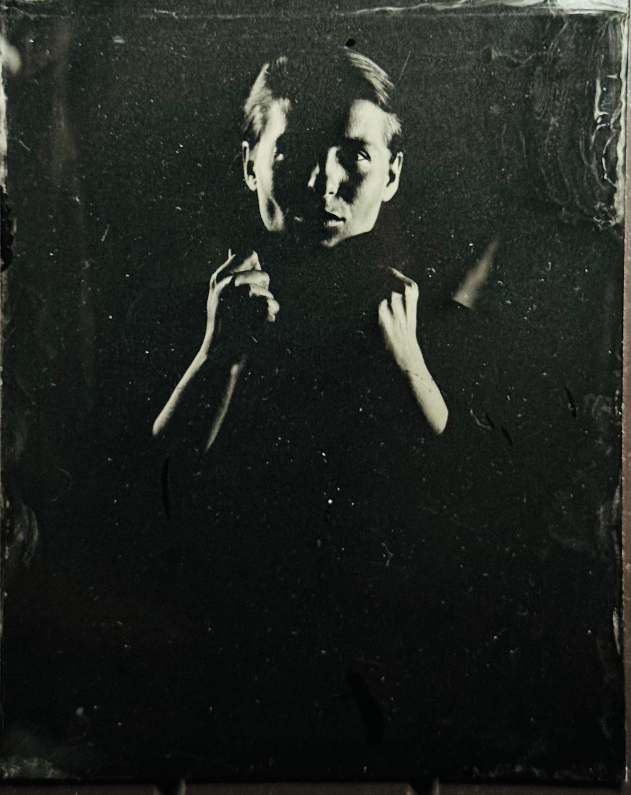 Handmade tintype portrait of a woman on a 4 by 5 metal plate